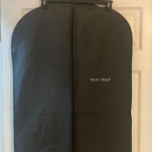 White House Black Market Black Garment Cover with White Logo
